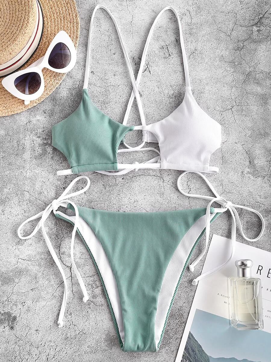 Stylish string bikini for women in green and white, featuring a push-up design with patchwork details, perfect for a modern beach look.