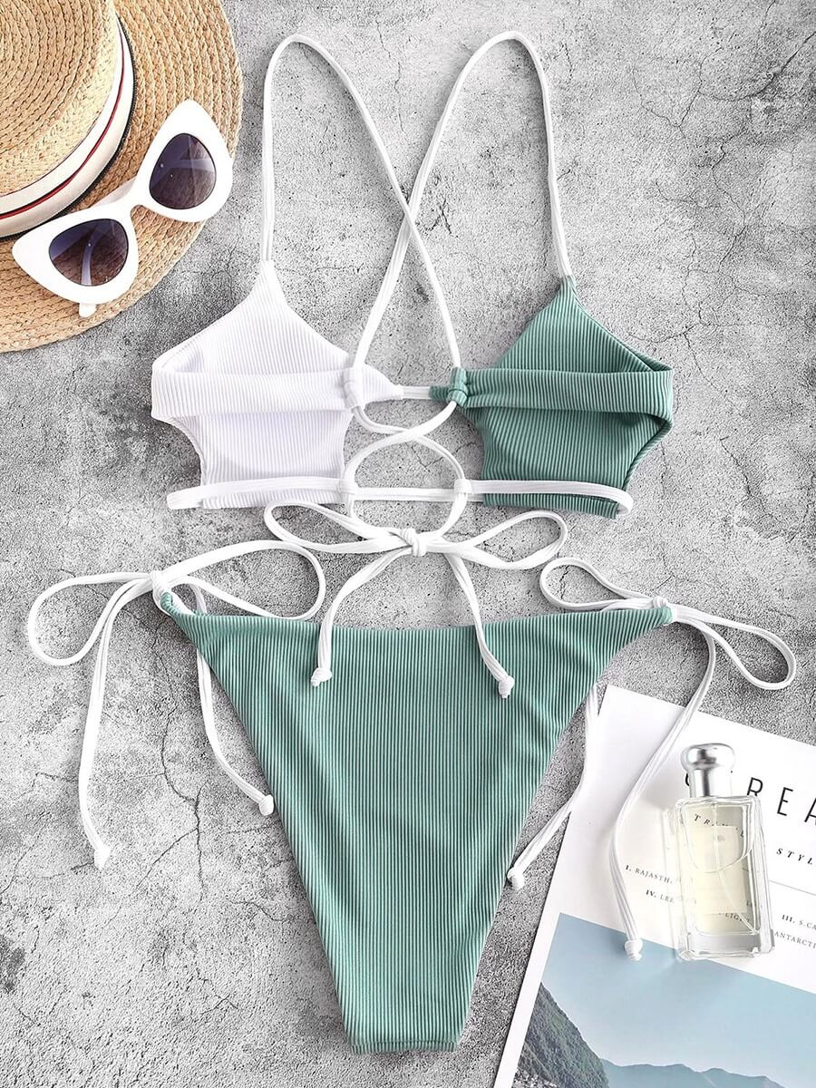 Trendy push-up string bikini for women with patchwork design in white and green, perfect for a stylish beach getaway.