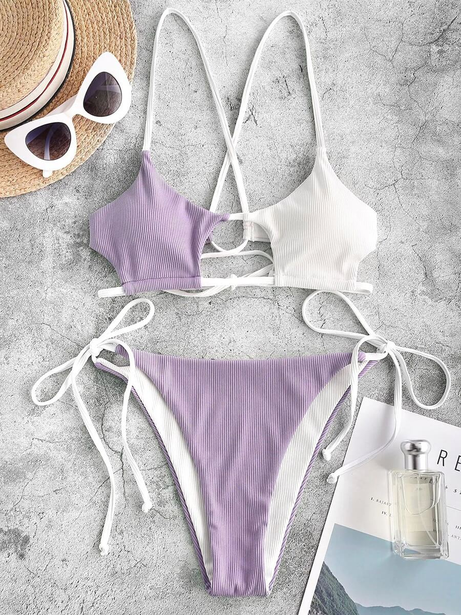 Stylish purple and white string bikini set for women with unique patchwork design, perfect for beach elegance and comfort.
