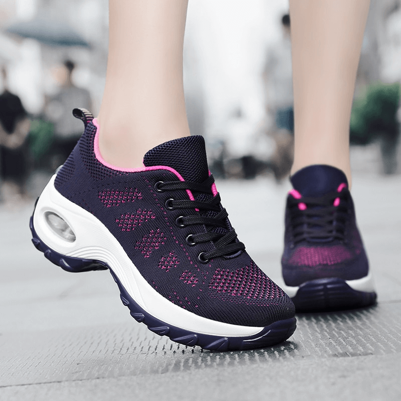 Stylish breathable women's sneakers SF0775 with a flexible mesh design, ideal for active outdoor wear.