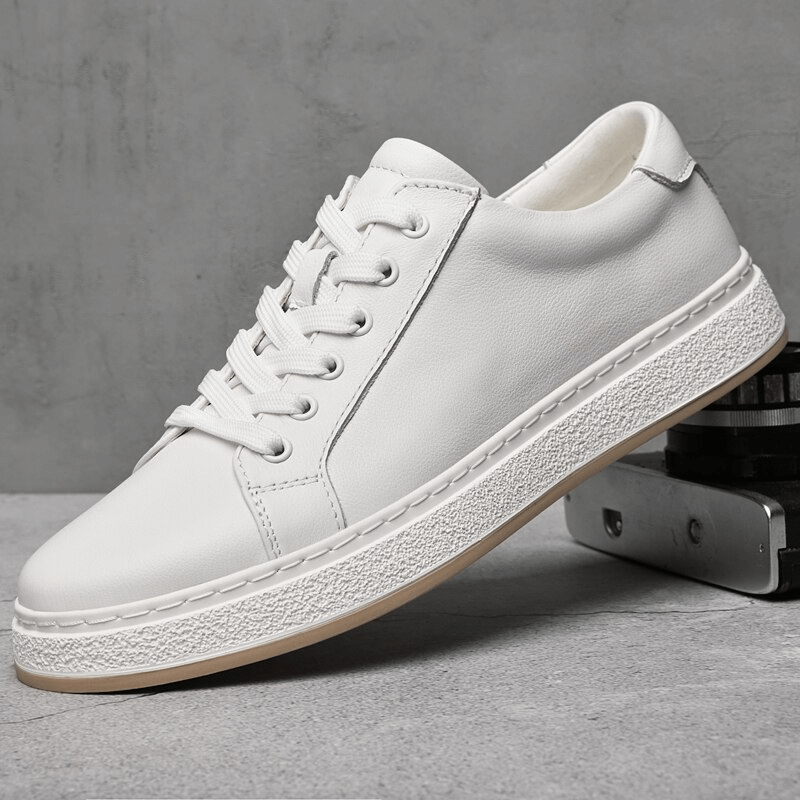 White stylish breathable men's leather shoe with lace-up closure and rubber outsole, SF1170 model, perfect for casual wear.