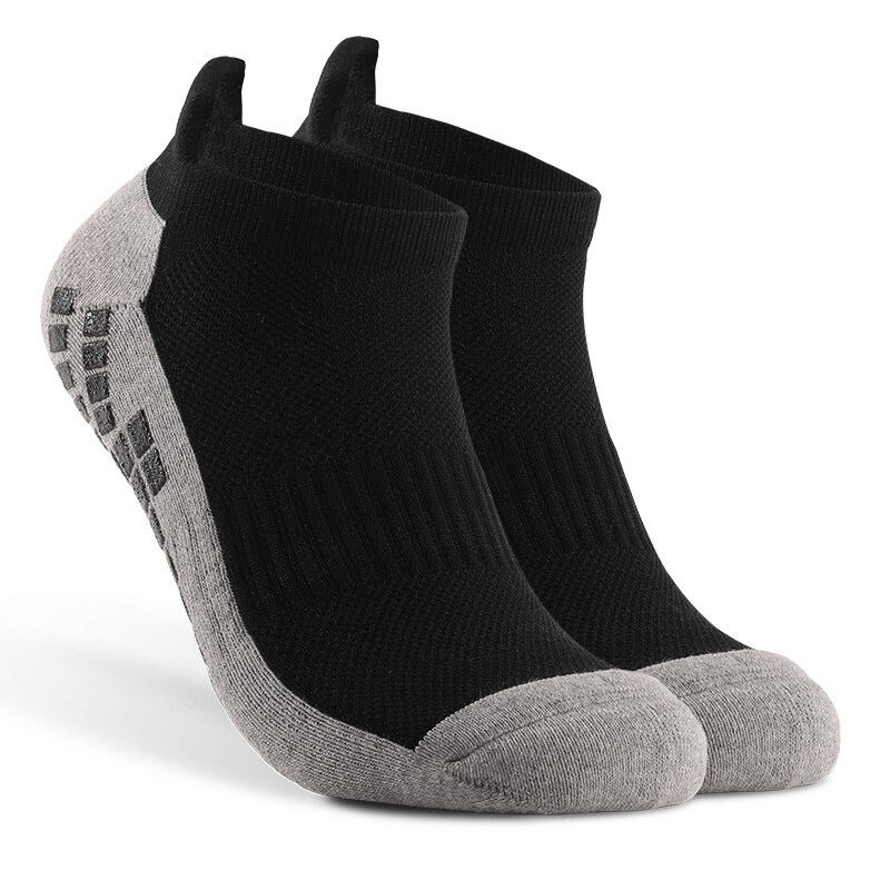 Stylish breathable non-slip sports socks with silicone soles for football, unisex design in black and grey, SF0829.