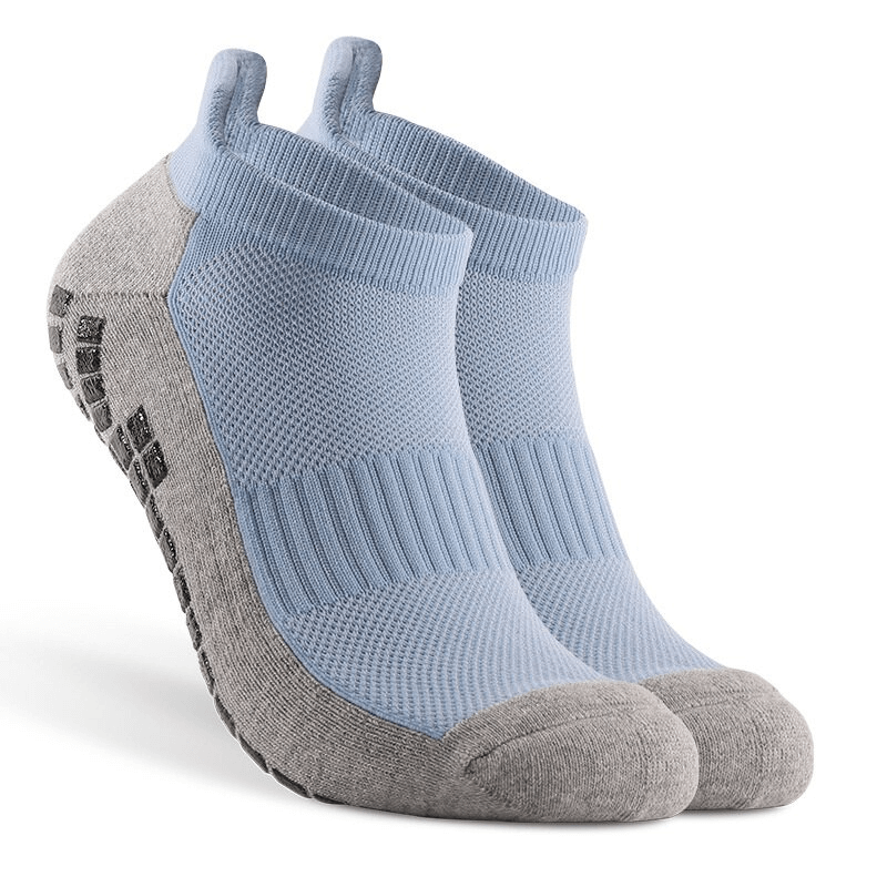 Stylish breathable non-slip sports socks with silicone soles for unisex football players, featuring tear-resistant cotton design.
