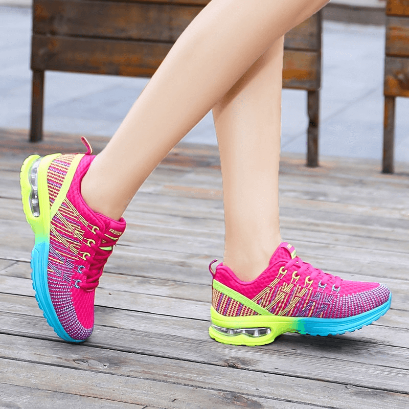 Bright mesh women's sneakers with breathable material and lightweight design, perfect for active sports or casual wear.