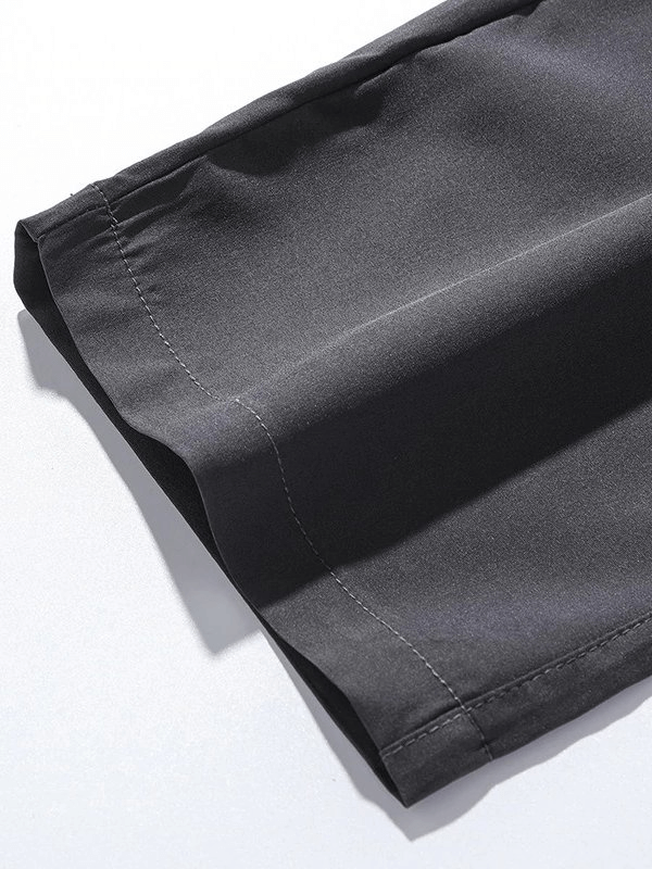 Close-up of stylish quick-drying black women's pants with elastic waist and pocket detailing, ideal for outdoor adventures.
