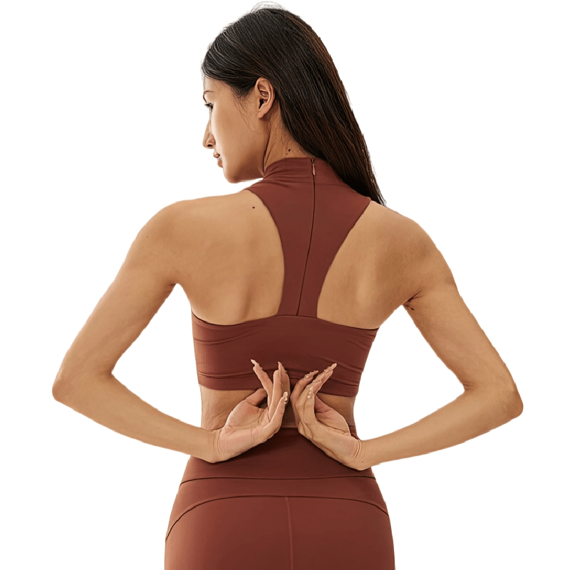woman wearing brown open-back stylish elastic sports bra SF1260, showcasing breathable quick-dry material and fit for fitness activities