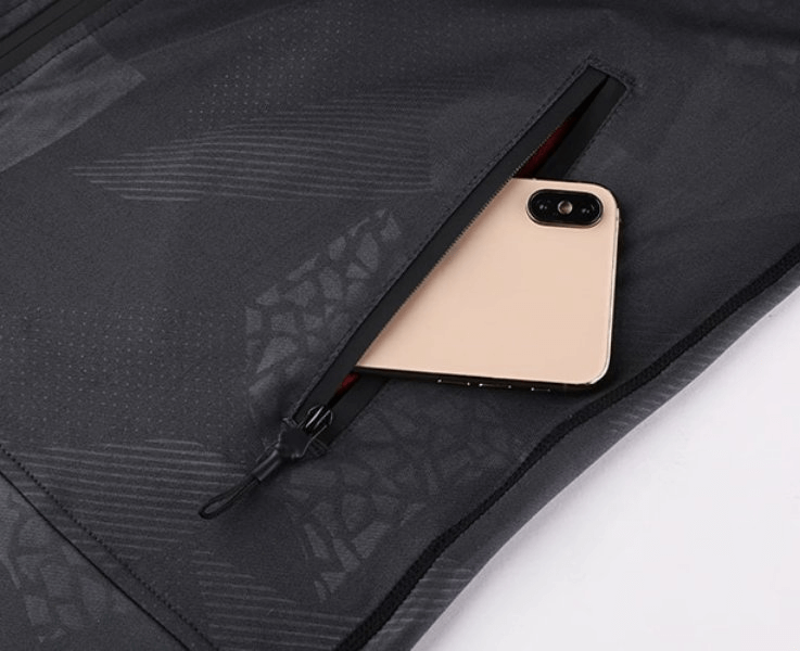 Close-up of stylish elastic sports men's hoodie with zipper and smartphone pocket, perfect for workouts and running.