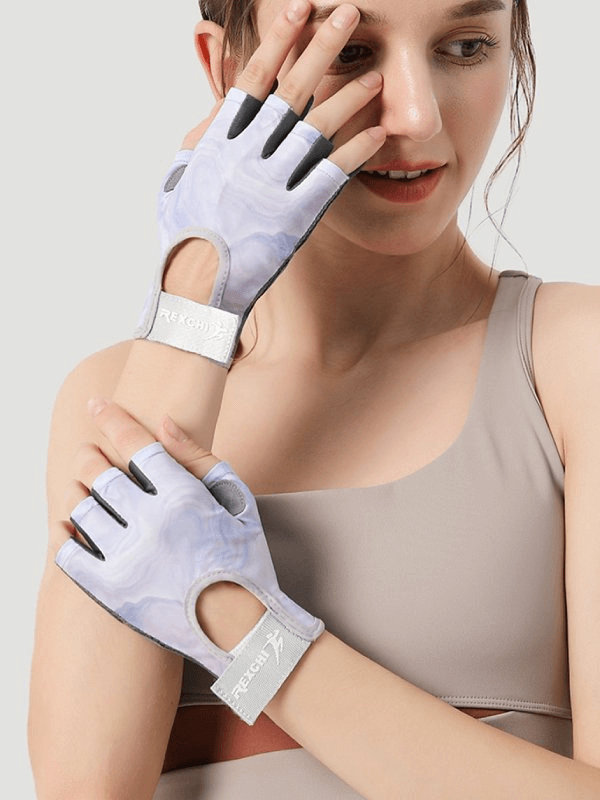 Woman wearing stylish elastic fingerless gloves for cycling, designed for comfort and durability with polyester and gel silicone.