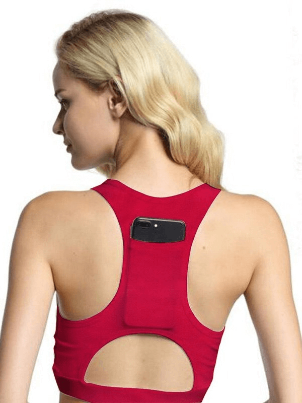 Woman wearing stylish elastic sports bra with back pocket filled with phone, ideal for fitness, shown from the back.