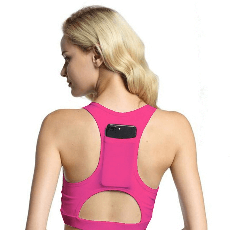 Back view of a woman wearing a pink sports bra with a phone pocket, perfect for fitness and workouts.