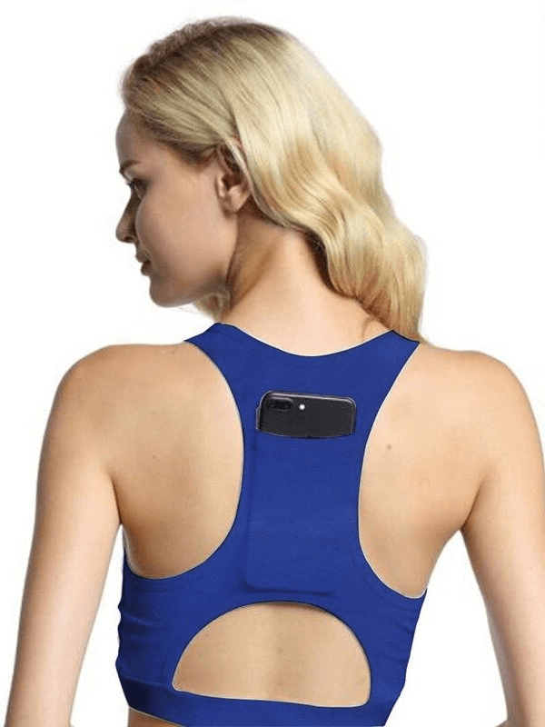 Woman wearing blue elastic sports bra with back pocket, perfect for fitness. Breathable polyester design for optimal performance.