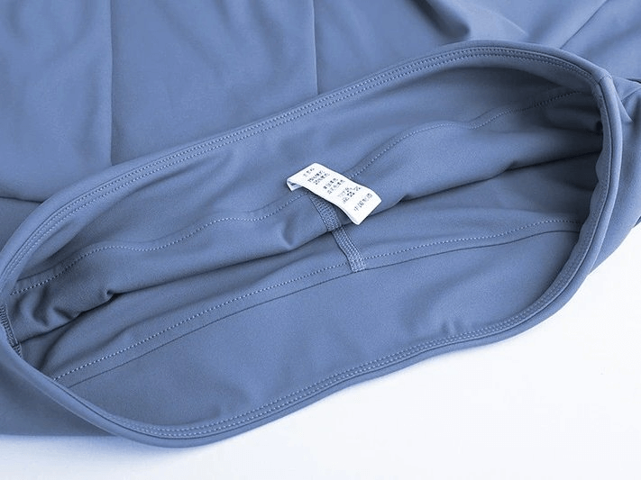 Close-up of Stylish Elastic Women's Tennis Shorts-Skirt showing the inner pocket and elastic waistband in grey fabric - SF0187