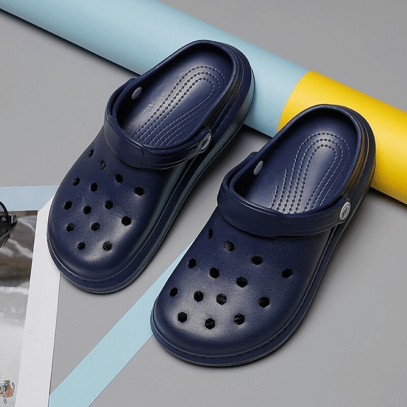 Stylish navy blue lightweight Crocs SF0281, featuring EVA material, 0-3cm platform, slip-on design, perfect for casual comfort.