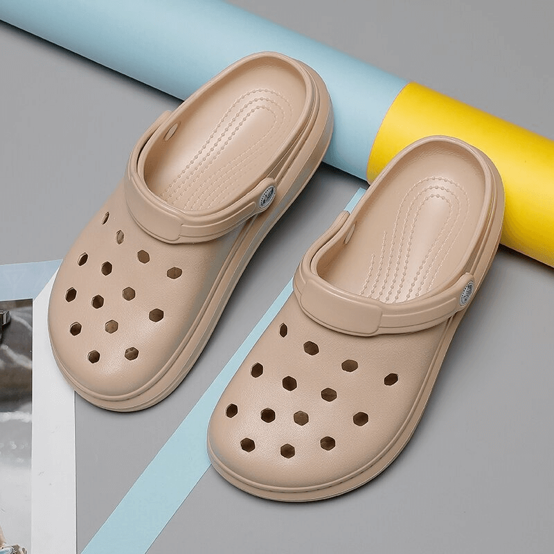 Beige Stylish Flexible Lightweight Unisex Crocs SF0281 on colorful background, featuring open side vamp and front & rear strap.