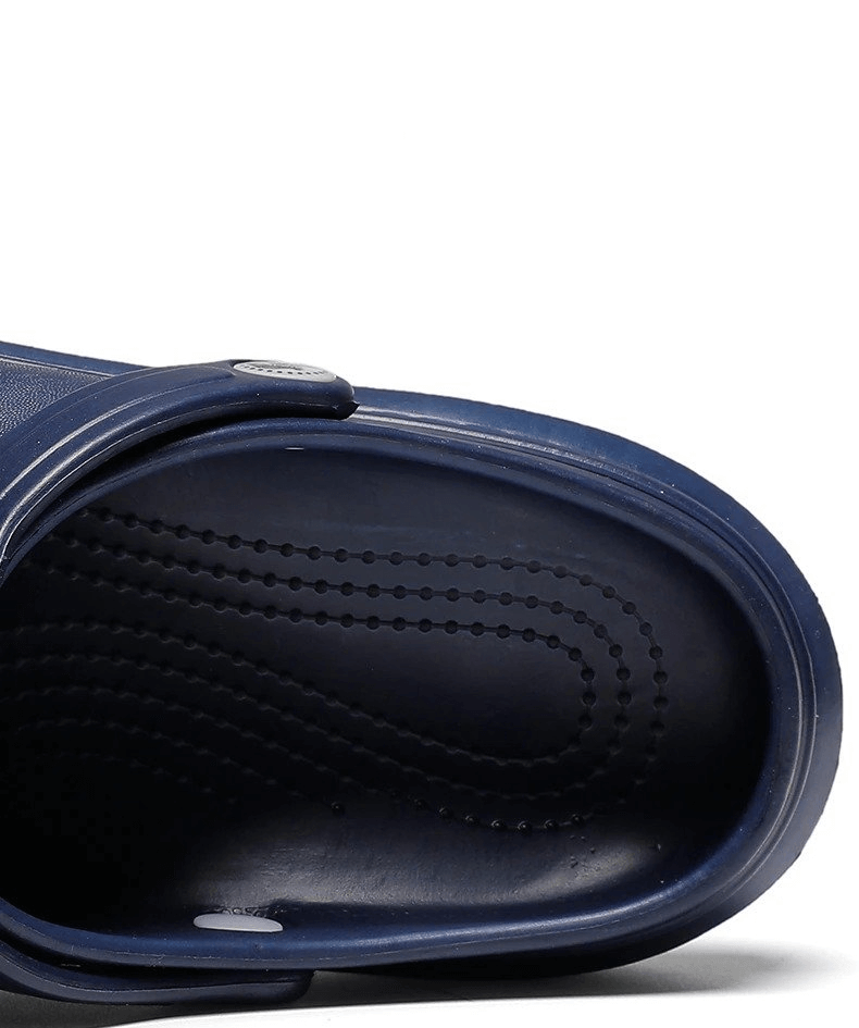 Close-up of the interior of a blue stylish flexible lightweight unisex Croc, showcasing textured EVA material for superior comfort.