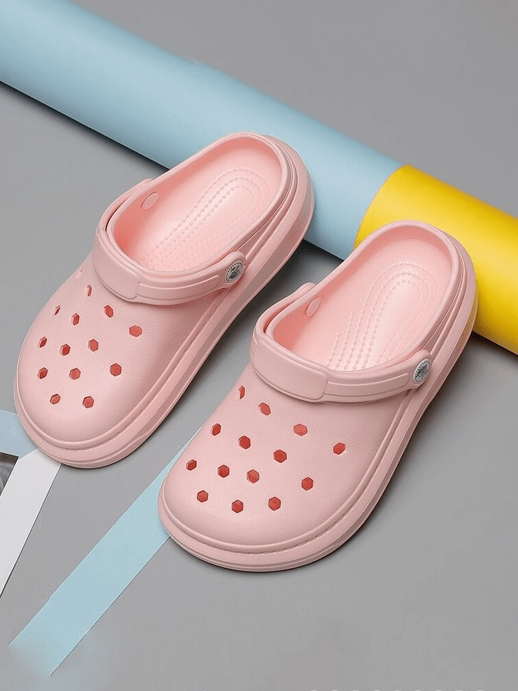 Pink Stylish Flexible Lightweight Unisex Crocs with hole pattern, perfect for casual wear and comfort. Model SF0281