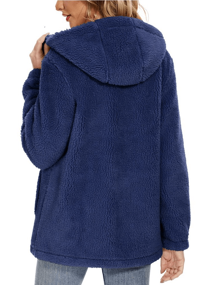 Woman wearing a blue stylish fluffy jacket with hood and zipper, showcasing cozy warmth and fashionable design. SF0905
