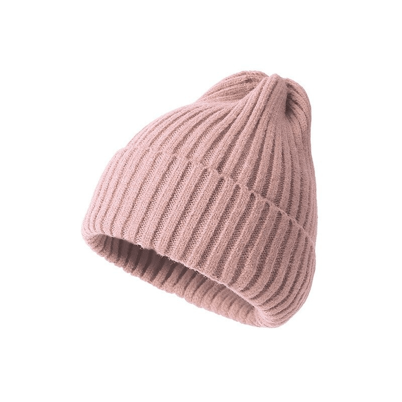 Stylish knitted plain women’s hat in pink, perfect for warmth and style. Made from cozy acrylic and woolen fabric, fits heads 48-54 cm.