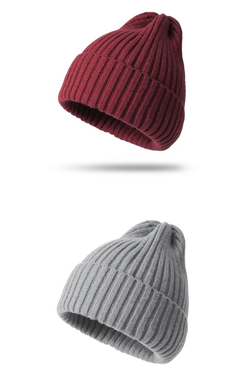 Two stylish knitted plain women's hats in burgundy and gray, showcasing cozy acrylic and woolen fabric for a chic and warm look.