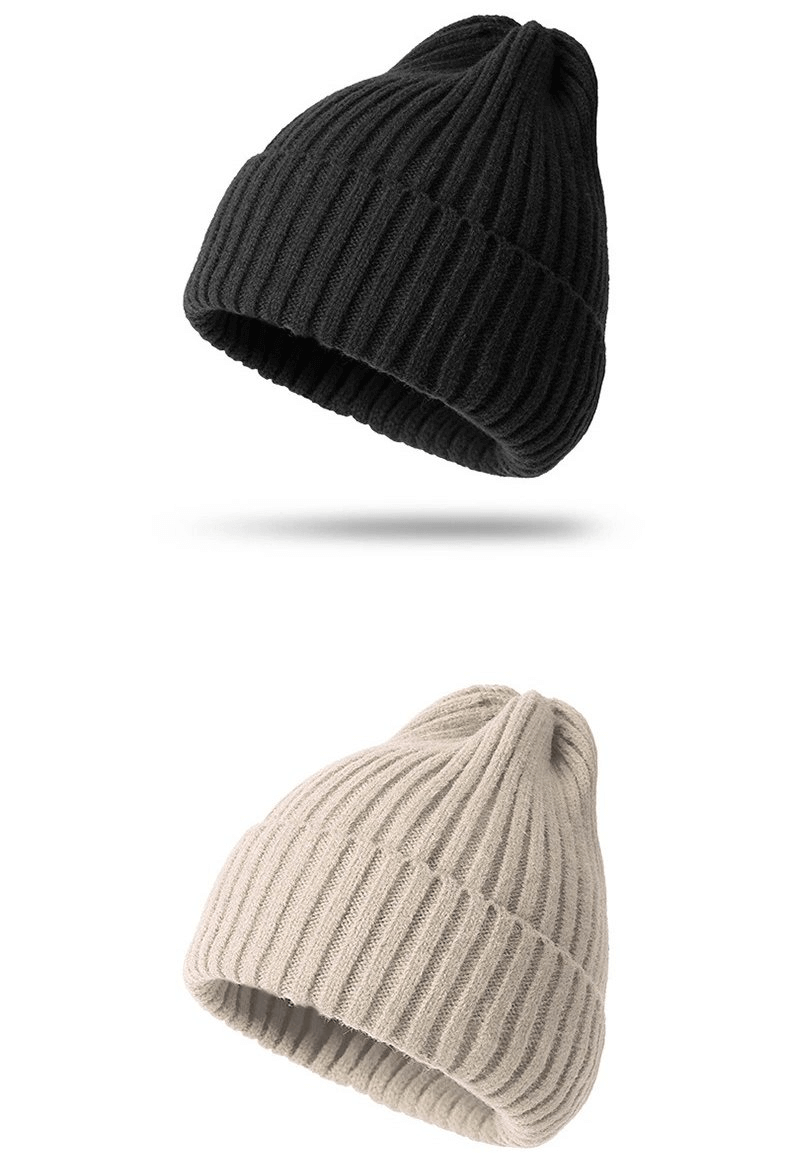 Two stylish knitted plain women's hats in black and beige, perfect for warmth and fashion. Made from acrylic and woolen fabric.