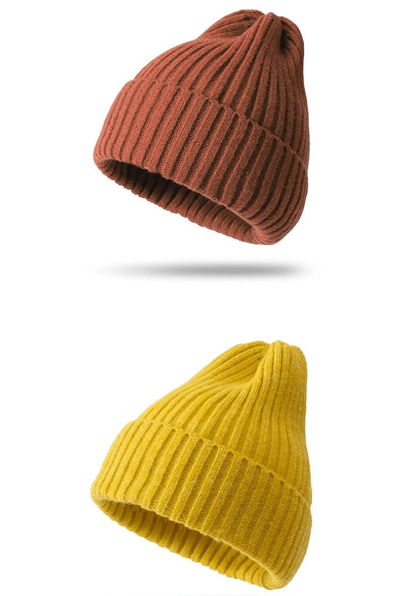 Stylish knitted plain women's hats in brick red and mustard yellow, perfect for fashion and warmth, made with cozy acrylic and woolen fabric.