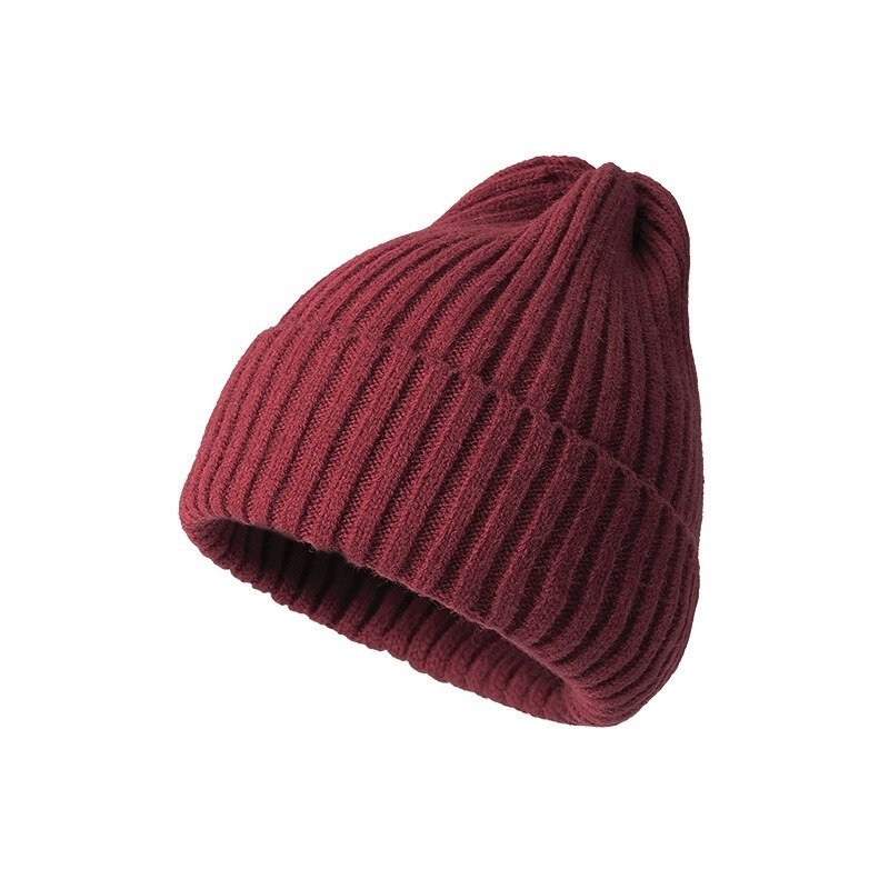 Stylish knitted plain women's hat in burgundy, crafted from cozy acrylic and woolen fabric for casual winter wear, fits head sizes 48-54.