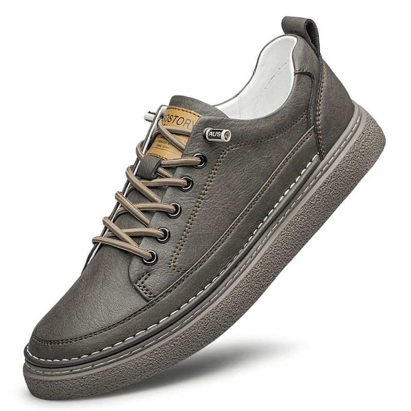 Stylish gray leather men's sneaker with lace-up closure and rubber sole, designed for breathability and comfort - Model SF1182.