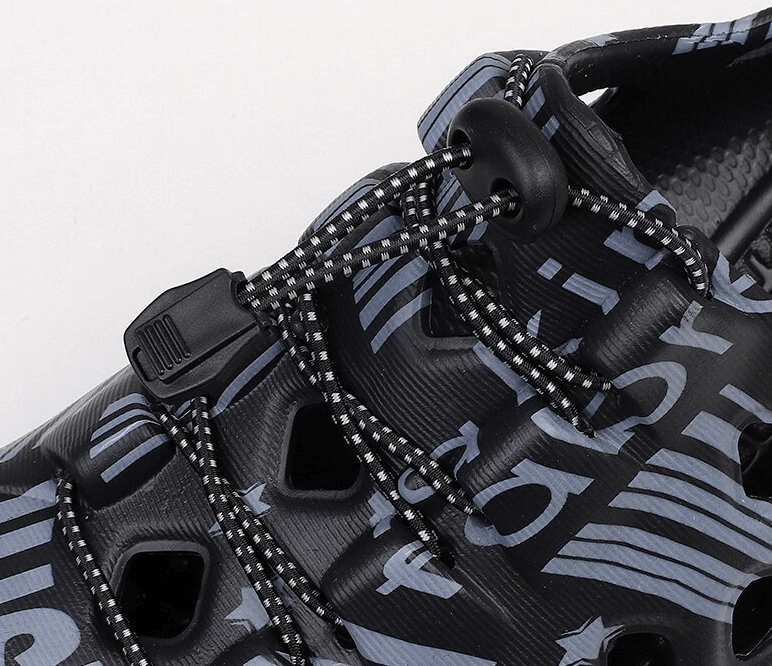 Close-up of stylish men's lightweight quick dry clogs SF1109 with EVA material and unique pattern, perfect for casual wear.