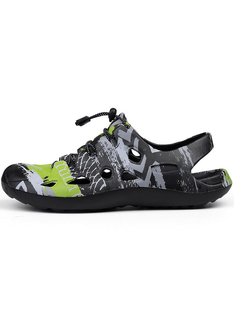 Stylish men's lightweight quick dry beach clogs in green and black with EVA material, ideal for casual wear and easy slip-on.