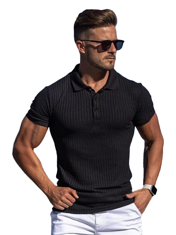 Man wearing a black stylish polo t-shirt with buttons and stripes, embracing a slim fit design. Ideal for a sophisticated and timeless look.