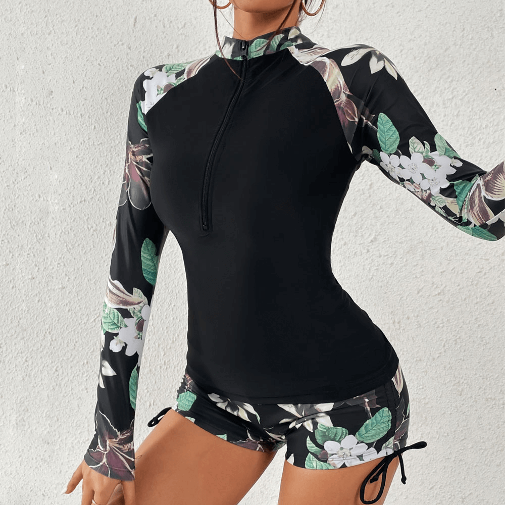 Stylish Split Women's Long Sleeve Surfing Swimwear with floral design, perfect for surfing and swimming, model showcasing front view.