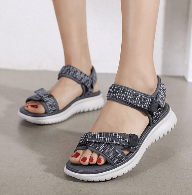 Women's stylish sports soft sandals with adjustable fasteners, perfect for summer. Featuring durable rubber sole and bonded leather insole.