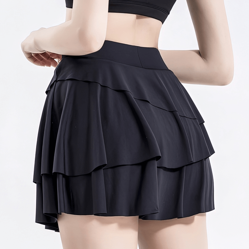 Stylish Sporty Women's Ruched Skirt-Shorts in black, ideal for yoga and workouts, featuring a comfortable elastic waistband and breathable fabric.