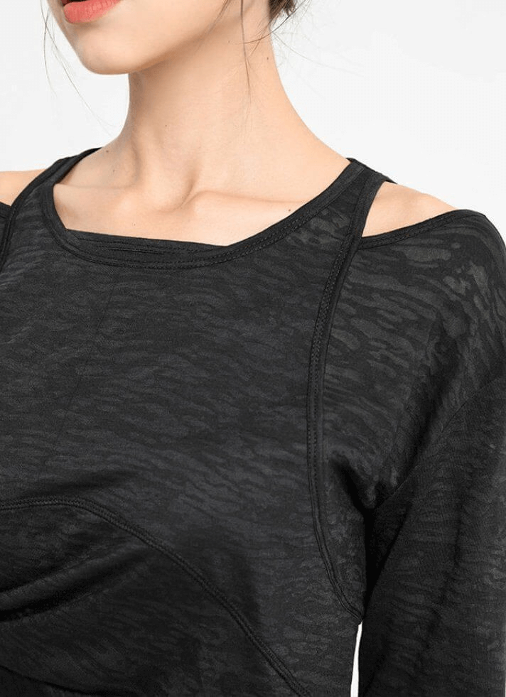 Stylish sporty lightweight long sleeve women's top with cutouts, perfect for yoga and active wear.