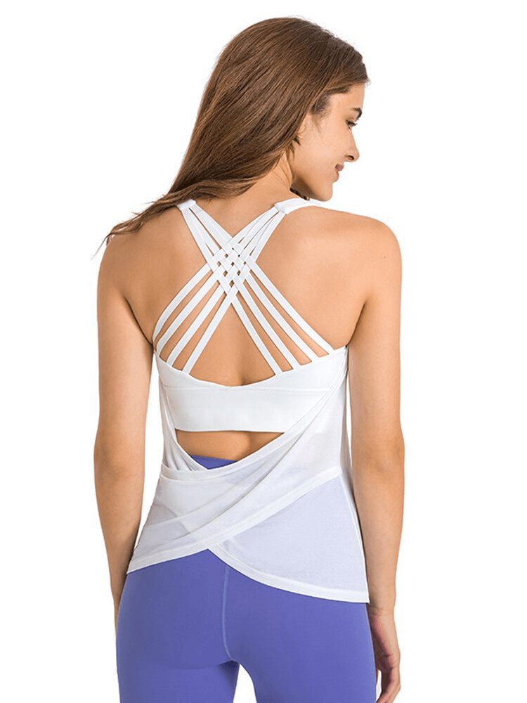 Woman wearing stylish sporty top with open back and cross straps, ideal for yoga and running. Quick-drying and anti-wrinkle fabric.