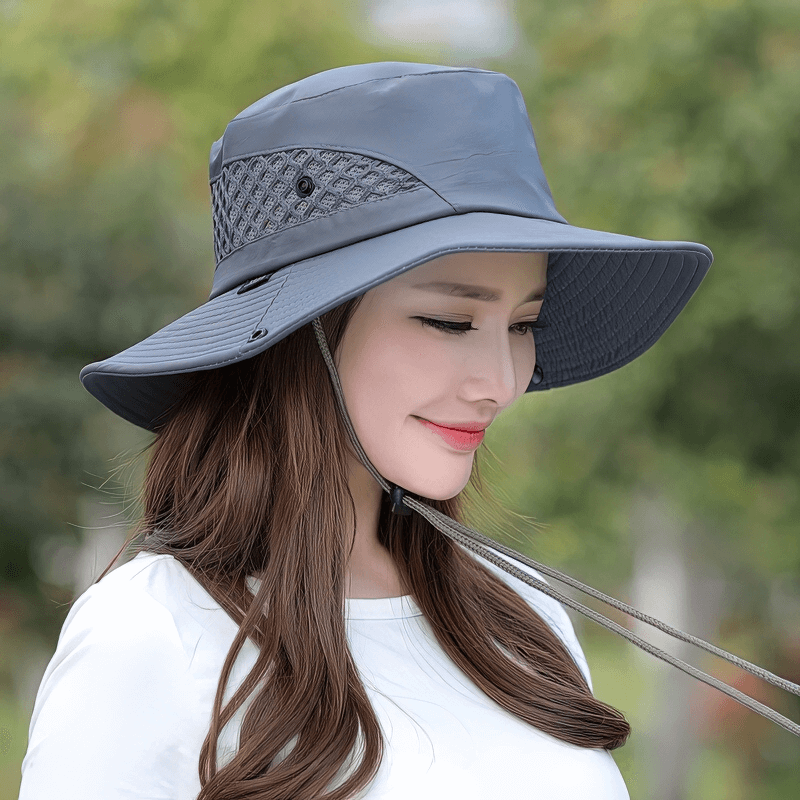 Unisex breathable sun hat with adjustable brim, perfect for outdoor activities. Made from polyester for style and sun protection.