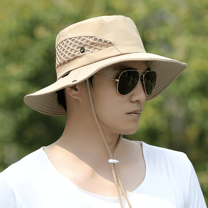 Stylish unisex breathable sun hat with adjustable brim, perfect for outdoor activities, shown on a person wearing sunglasses.