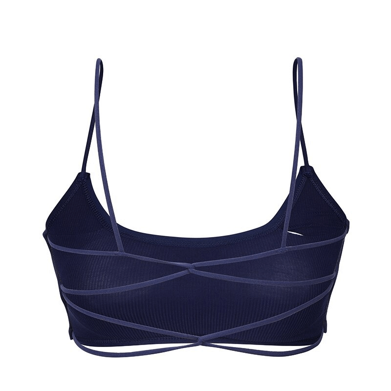 Stylish wireless women's sports bra with open back, navy blue, ideal for yoga, breathable modal, comfortable fit, fashion-forward design.