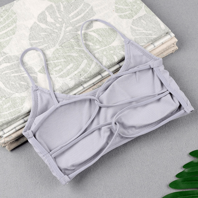 Stylish wireless women's sports bra with open back, light gray color, ideal for yoga, breathable modal fabric, comfortable for A-B cup sizes