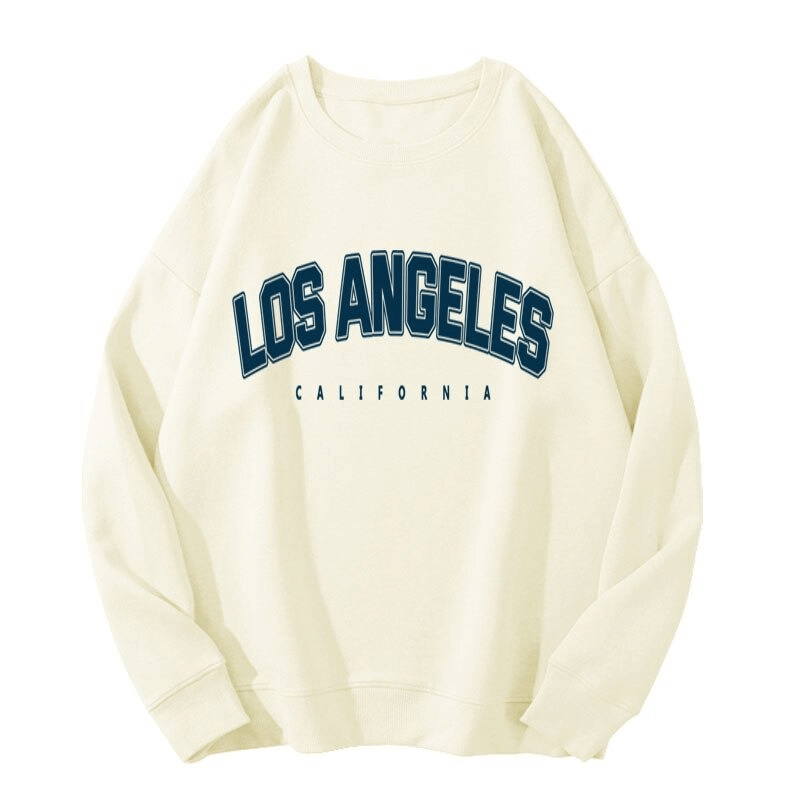 Stylish women's letter graphic print sweatshirt "Los Angeles" cozy and warm fleece, loose fit with o-neck collar in cream color.