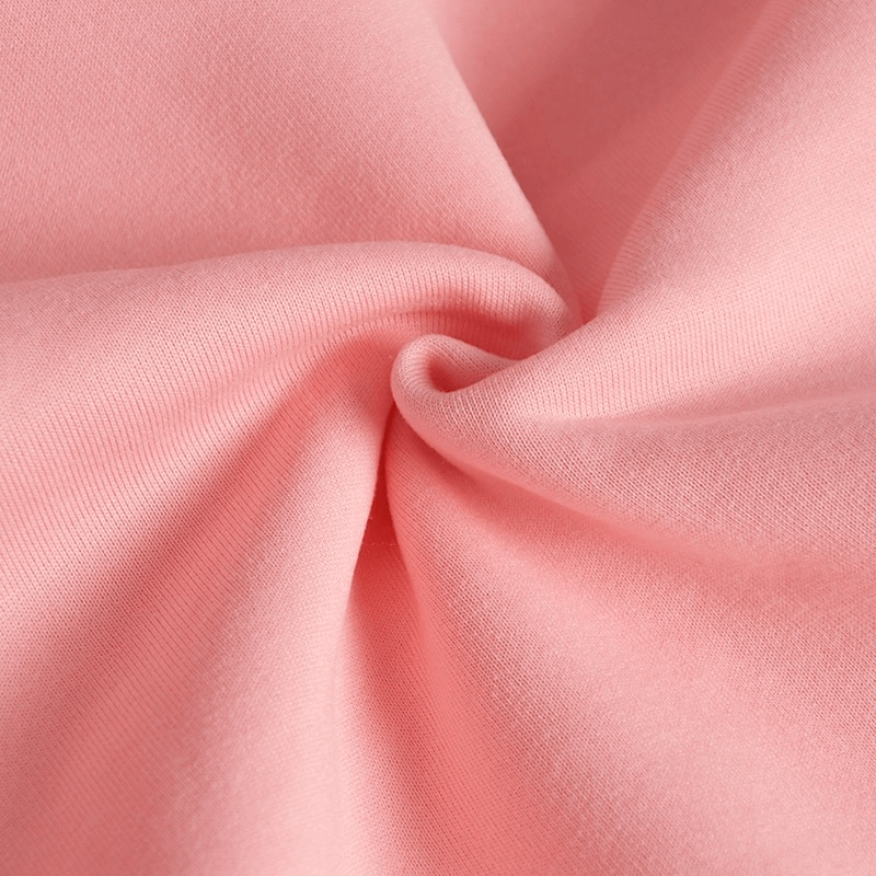 Close-up of soft pink fleece fabric with natural fiber, showcasing the cozy and warm texture of the Stylish Women's Sweatshirt.