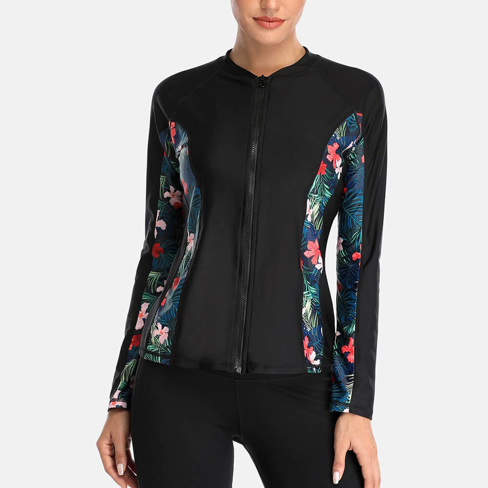 Stylish women's long sleeves rashguard top with floral patterns and zipper front, ideal for swimming and water activities, SF0527.