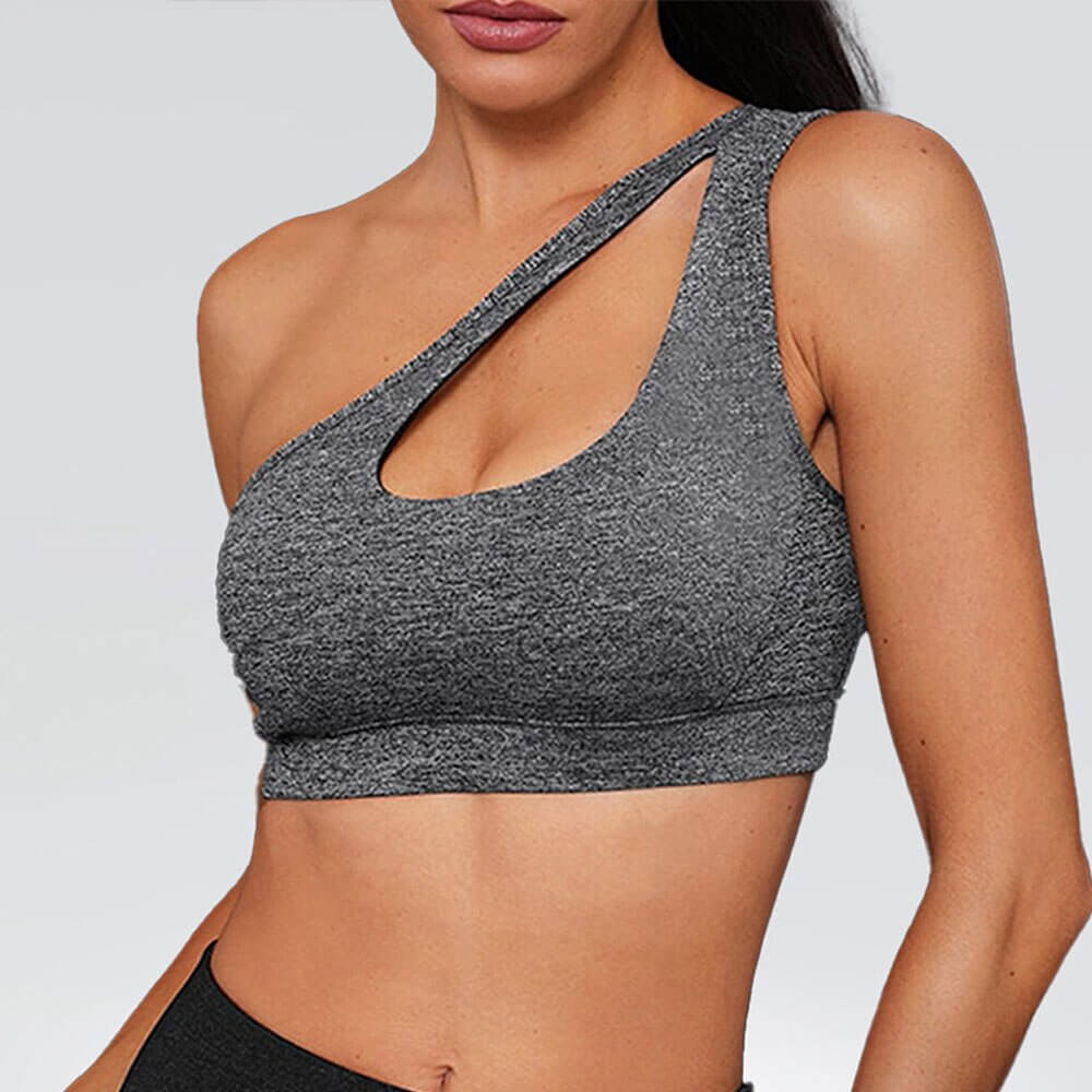 Grey one-shoulder sports bra SF0981 for women, ideal for fitness, featuring breathable spandex and nylon material.