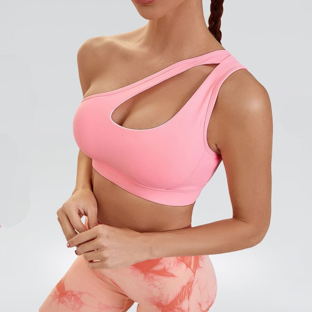 Pink one-shoulder sports bra for women, stylish and breathable, perfect for fitness and workouts.