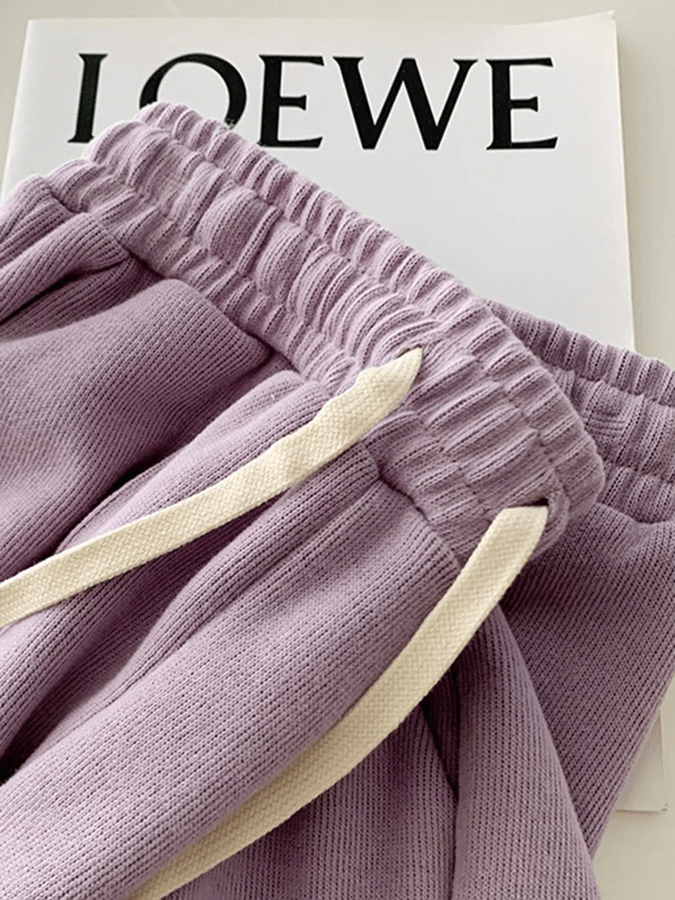 Lilac women's shorts with high elastic waist and side pockets, perfect for casual wear. SF0181 fashion.