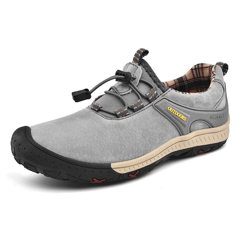 Gray suede leather hiking shoe for men with elastic band and non-slip sole, ideal for outdoor adventures. Model SF0719.
