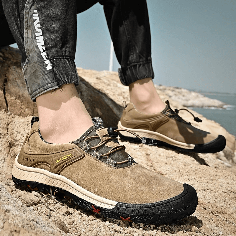 Suede leather men's hiking shoes with non-slip soles and elastic band, perfect for outdoor adventures. Model SF0719.
