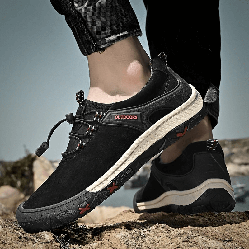 Men's suede leather hiking shoes with elastic band and non-slip sole, perfect for outdoor adventures.