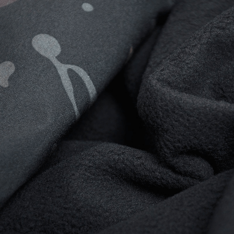 Close-up of a black fleece jacket, showcasing waterproof material and insulating fleece lining, perfect for tactical sportswear.