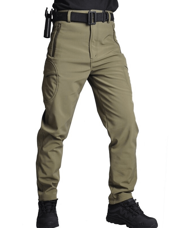 Men's tactical waterproof pants for outdoor activities, shown in khaki, featuring quick-dry and antistatic technology.
